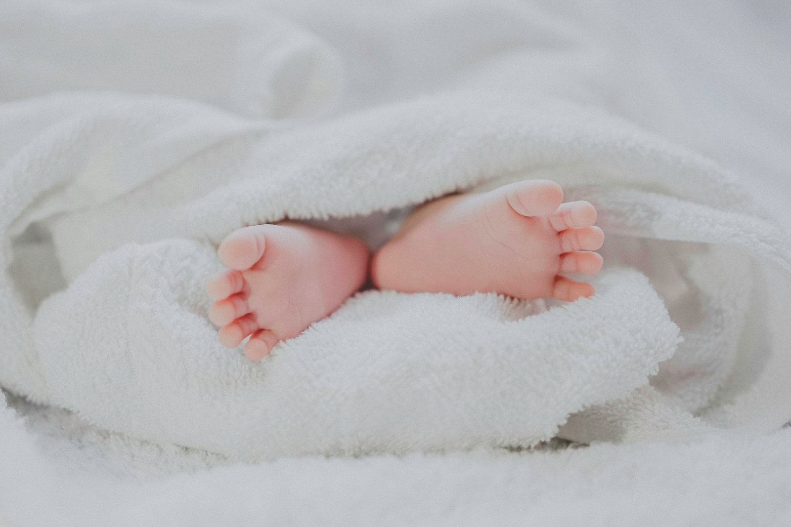 Newborn baby with mother after delivery